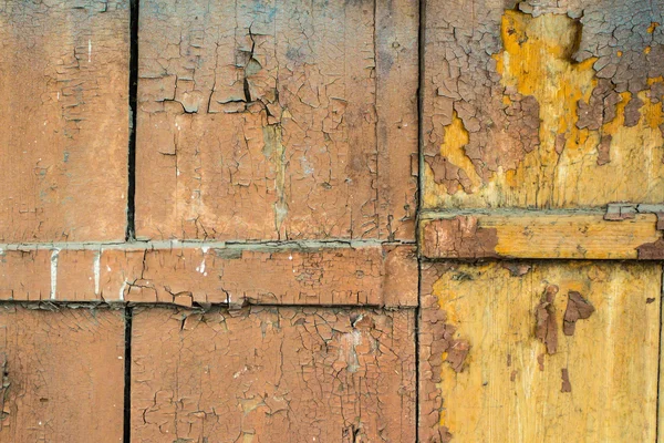 Sfondo vecchie tavole di legno dipinte con vernice incrinata — Foto Stock