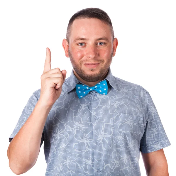 Attractive adult man with stubble in summer shirt that shows gesture on an isolated white background — Stock Photo, Image