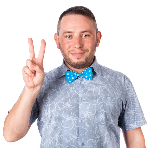 Atractivo hombre adulto con rastrojo en camisa de verano que muestra gesto sobre un fondo blanco aislado — Foto de Stock