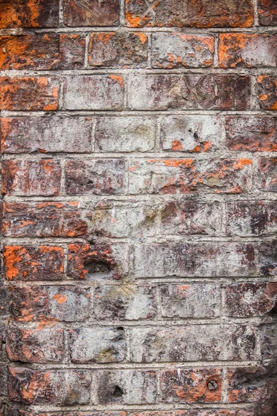 Hintergrund Textur. die Wand des alten roten Ziegels mit weißer Farbe bespritzt — Stockfoto