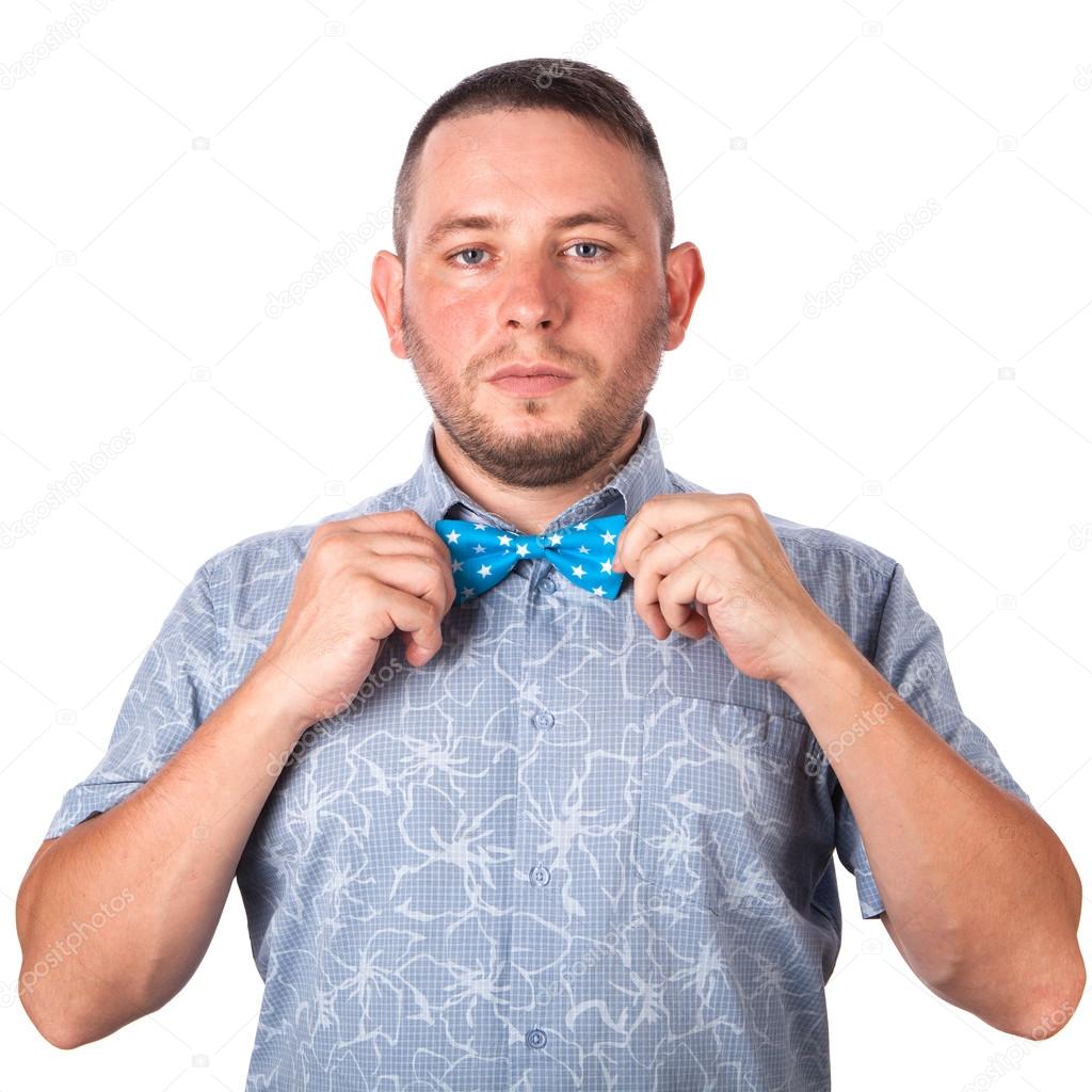 Attractive adult man with stubble in summer shirt that shows gesture on an isolated white background