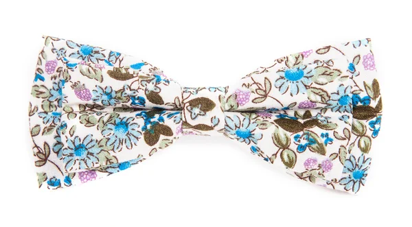 Blue bow tie with a pattern with summer flowers on an isolated white background — Stock Photo, Image