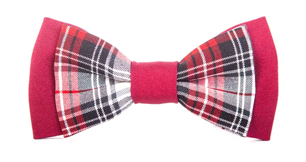 Red bow tie met een zwarte patroon op een afgelegen witte achtergrond — Stockfoto