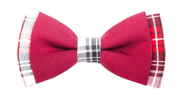 Red bow tie met een zwarte patroon op een afgelegen witte achtergrond — Stockfoto