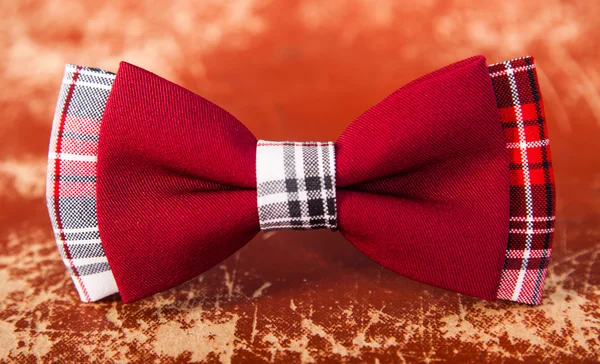 Red bow tie met een zwarte patroon — Stockfoto