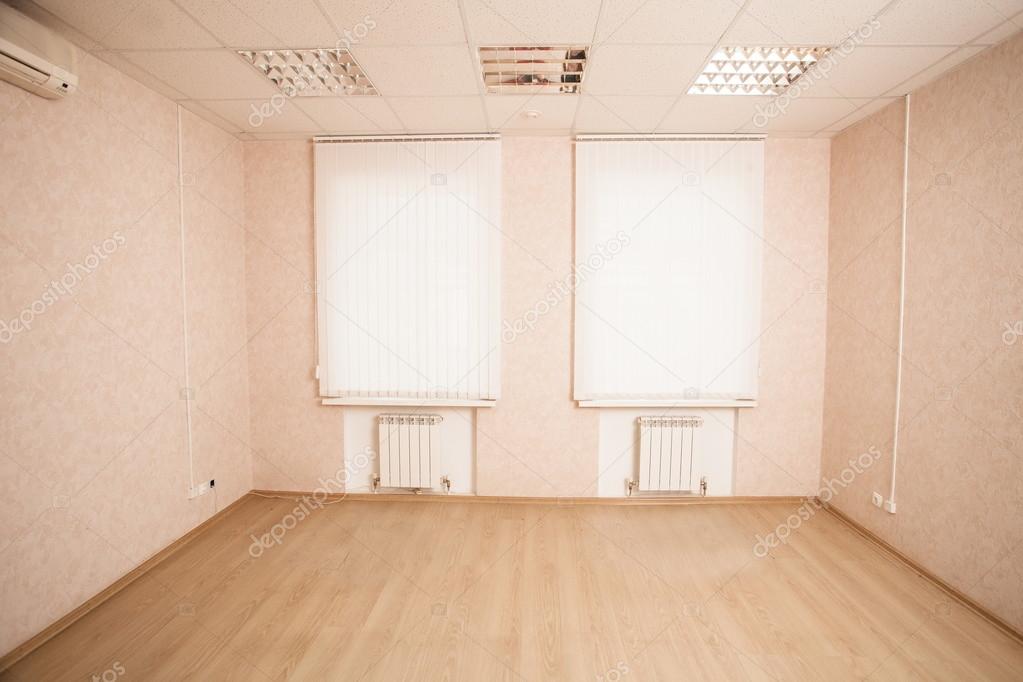 Empty office space with windows