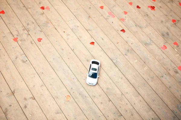 Abandoned children toy cars on the wooden floor — Stock Photo, Image