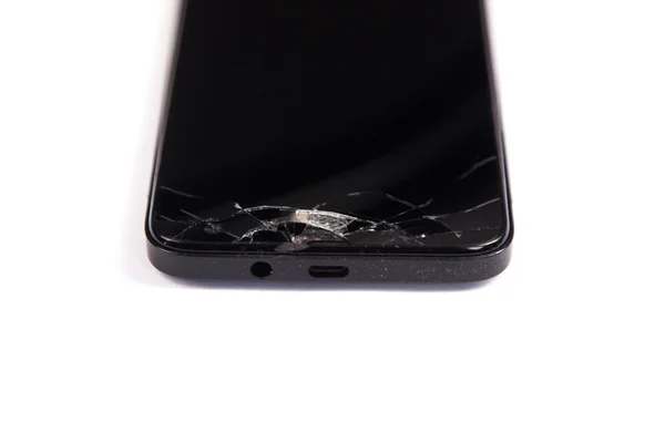 Broken screen mobile phone black isolated on a white background — Stock Photo, Image