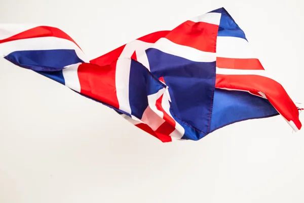 The fall of the flag of Britain. Falling leaf of a great state. — Stock Photo, Image