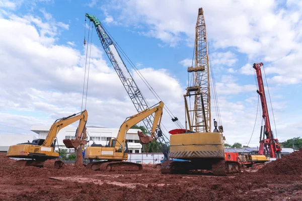 excavator heavy machine and mobile crane tower crane in new construction site