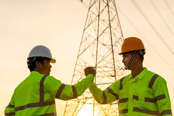 Two Engineers Join Hands Success Work Inspections Electric Power Station — Stock Photo, Image