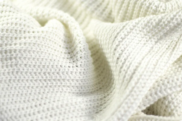 Fragment of a wrinkled knitted white Stock Picture