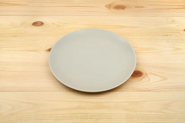 Empty Plate on wooden background. — Stock Photo, Image