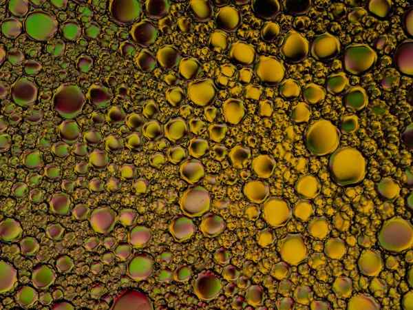 Λάδι Φυσαλίδες Του Χρώματος Πράσινο Και Κίτρινο Στην Επιφάνεια Του — Φωτογραφία Αρχείου