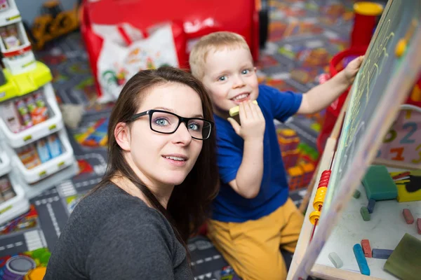 Taking care of kids is fun — Stock Image Taking care of kids is fun Stock Picture