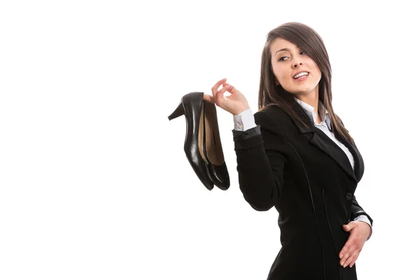 Giovane donna d'affari con tacchi alti dopo il lavoro — Foto Stock