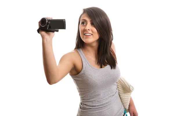 Beautiful tourist with video camera — Stock Photo, Image