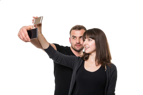 Dubbele selfie te nemen Stockafbeelding