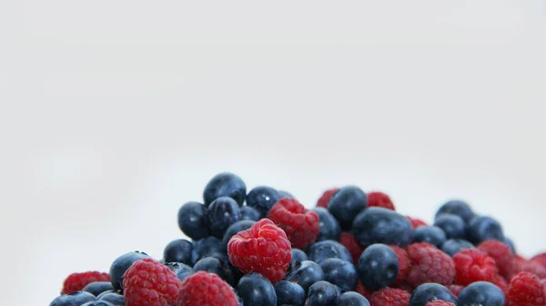 Fresh Raspberries Blueberries White Background Close Wild Summer Berries Blueberries - Stock-foto