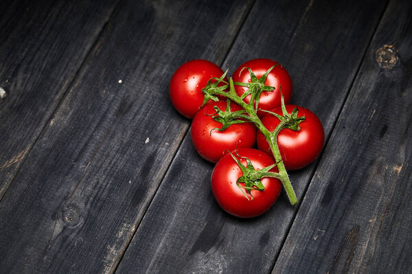 stock photo of tomatoes on a stem background