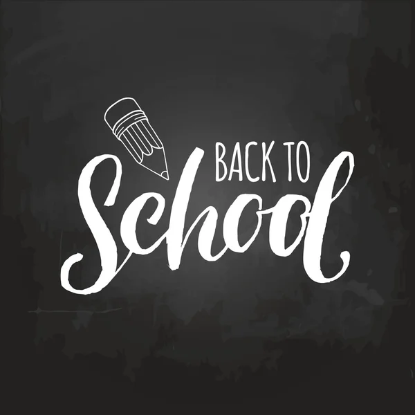 Back to school lettering on blackboard — Stock Vector