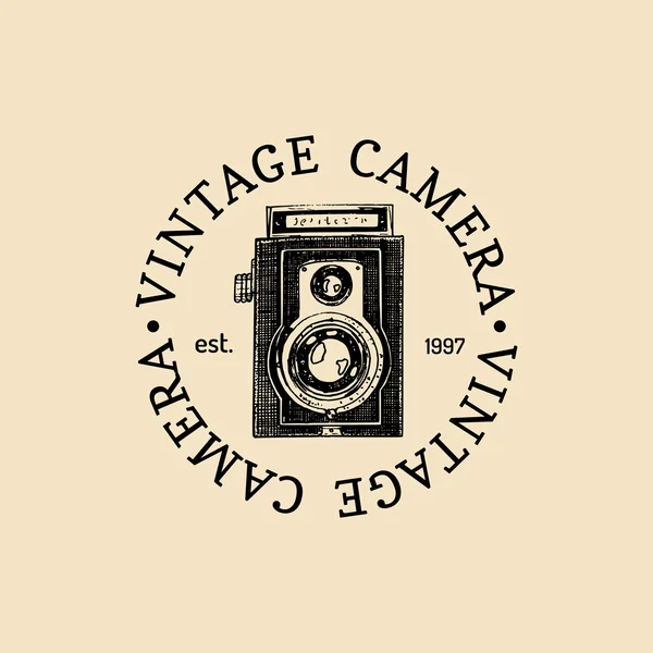 Logo de fotografía. cámara vintage — Vector de stock