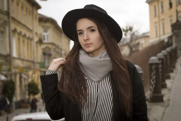 Lovely brunette woman in hat — Stock Photo, Image