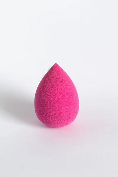 Pink beauty blender on a white background. Closeup shot — Stock Photo, Image