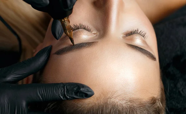 Closeup Shot Beautician Black Gloves Applying Permanent Brow Makeup Blonde — Stock Photo, Image