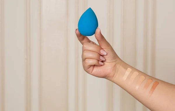 Makeup Artist Holding Blue Beauty Blender Having Swatches Liquid Foundation Stock Picture