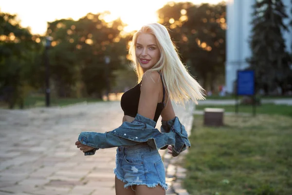 Lifestyle Shot Cheerful Woman Fluttering Hair Wears Denim Shorts Jacket Royalty Free Stock Images