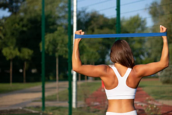 Strong Fitness Woman Working Out Rubber Band Sport Yard Empty — Stock Photo, Image