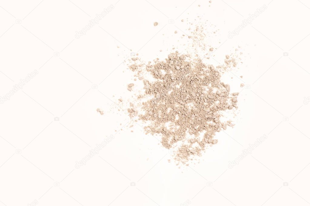 Crushed silver eye shadow on a white background . Space for text