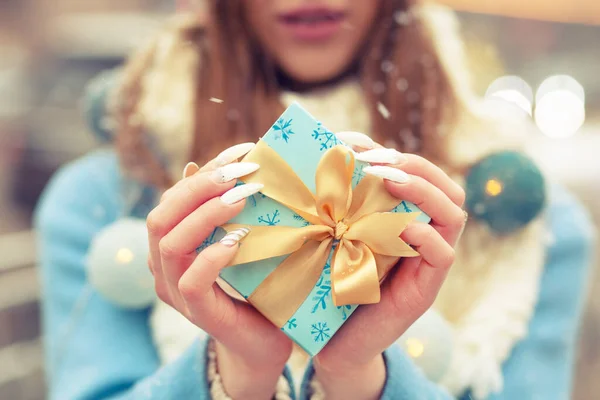 Woman Dressed Warm Blue Coat Holding Gift Box Silk Ribbon — Stock Photo, Image