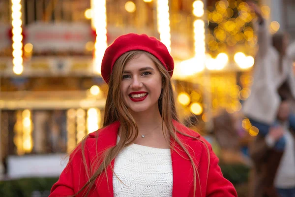 Cheerful Young Woman Red Coat Walking Street Fair — Stock Photo, Image