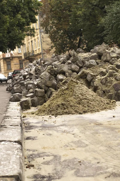 Stone blocks lying at the pavement — Stock Photo, Image