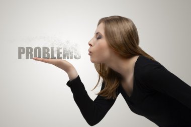 girl blows away the problems clipart