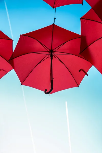 Roter Regenschirm lizenzfreie Stockbilder