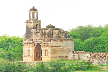 ruins in massive Chittorgarh Fort and grounds rajasthan india clipart