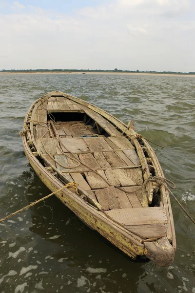 Ancient wooden boat on river Royalty Free Stock Photos