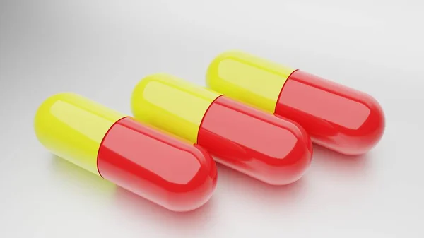 Três Cápsulas Com Cores Vermelho Amarelo — Fotografia de Stock