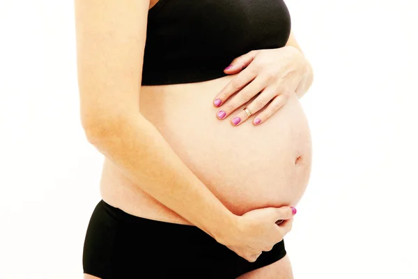Женщина беременна — стоковое фото
