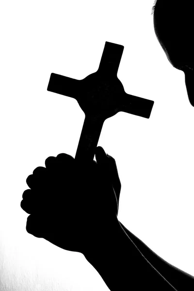 Религиозный человек с руками в молитве — стоковое фото