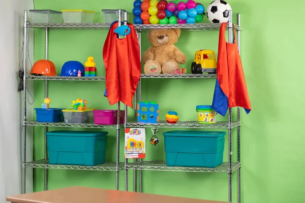 Toy store with racks ands toys. Interior detail and general plane