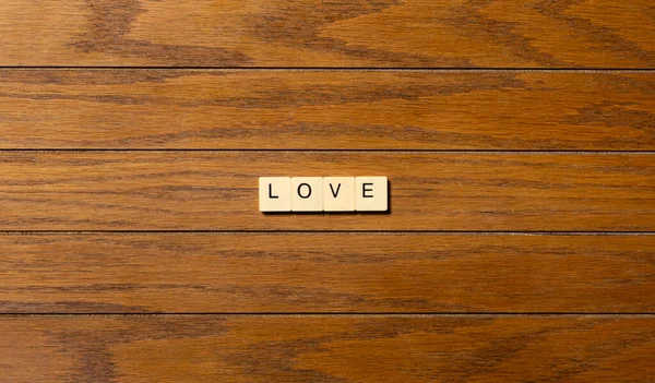 Concepto Fondo Palabra Amor Escrito Bloques Sobre Tabla Madera —  Fotos de Stock