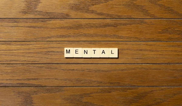 Konsep Latar Belakang Kata Mental Ditulis Pada Blok Atas Meja — Stok Foto