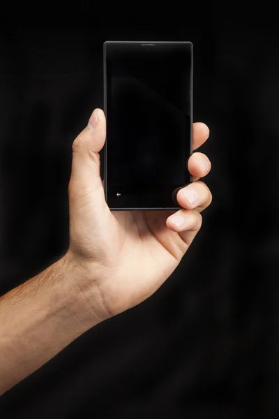 Mão com celular — Fotografia de Stock
