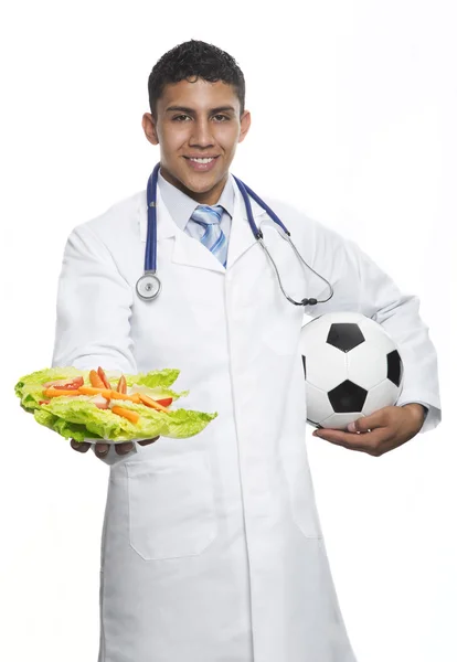 Doctor with soccer ball — Stock Photo, Image