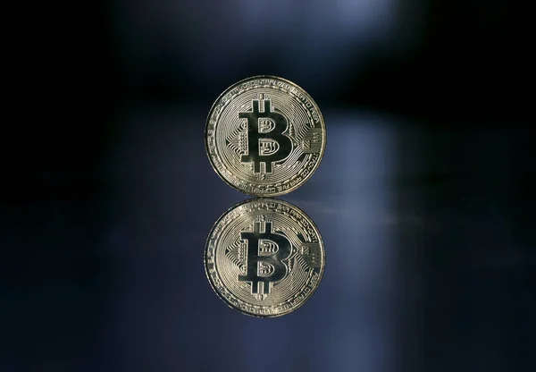 Bitcoin. Crypto currency Gold Bitcoin, BTC, Bit Coin. Macro shot of Bitcoin coins isolated on black background Blockchain technology, bitcoin mining concept. 3d rendering Stock Picture