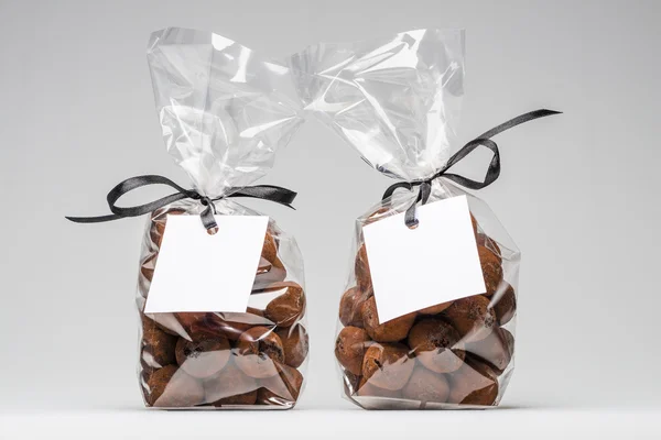 Noel GIF için çikolata truffles iki zarif plastik torba